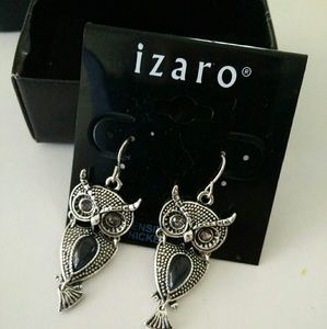 Striking silvertone trendy shaped Owl Earrings